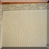 D09. Bordered area rug. 12' x 10'10” 